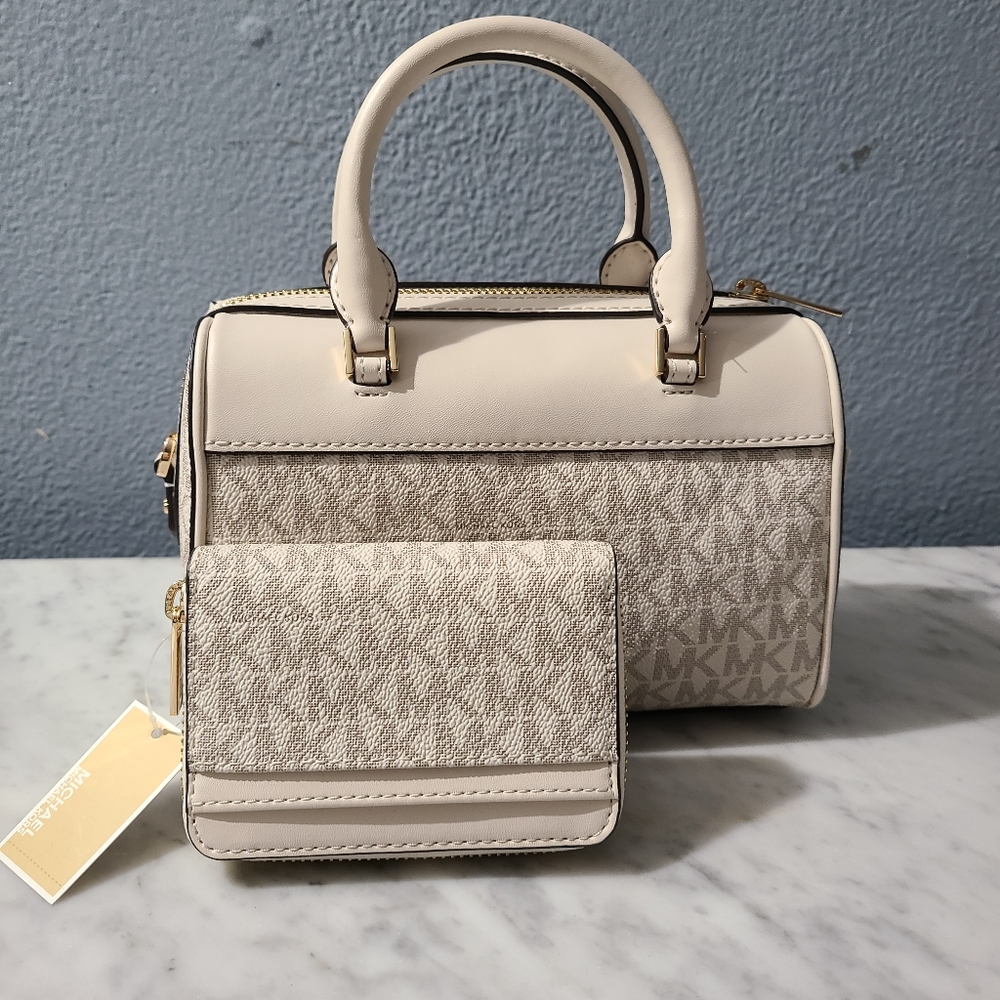 Michael kors small travel Duffle crossbody bag with a matching zipper wallet